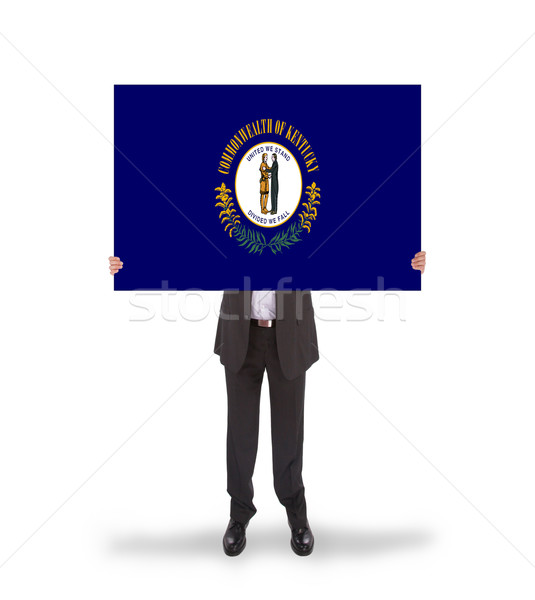 Smiling businessman holding a big card, flag of Kentucky Stock photo © michaklootwijk