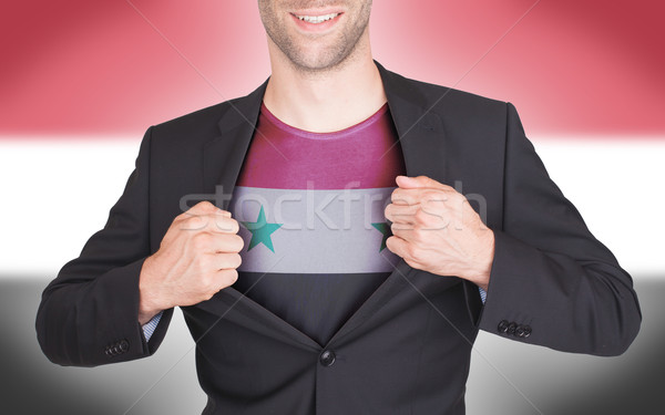 бизнесмен открытие костюм рубашку флаг Сирия Сток-фото © michaklootwijk