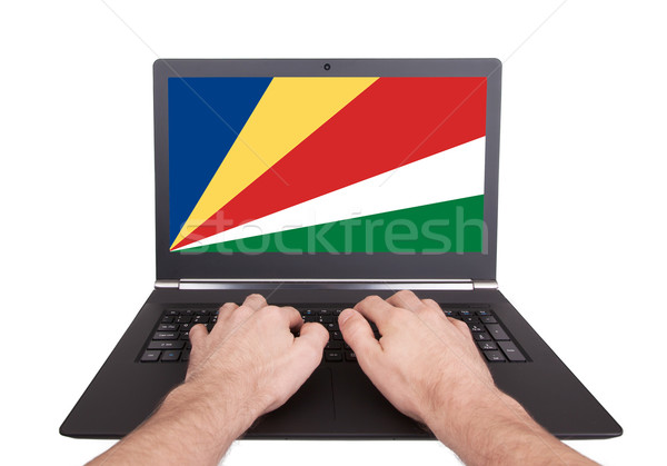 Handen werken laptop Seychellen tonen scherm Stockfoto © michaklootwijk