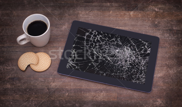 Stock photo: Tablet computer with broken glass