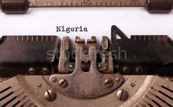 Velho máquina de escrever Nigéria país carta Foto stock © michaklootwijk