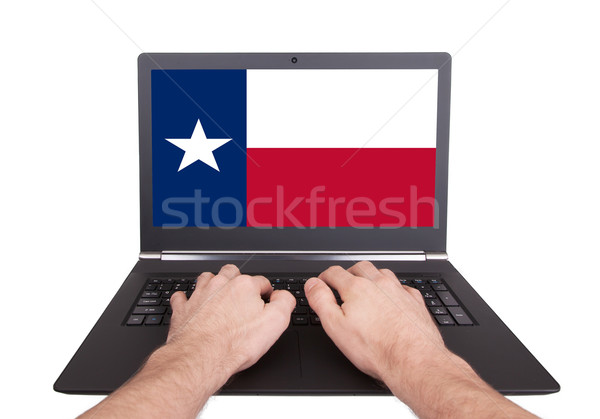 Hands working on laptop, Texas Stock photo © michaklootwijk