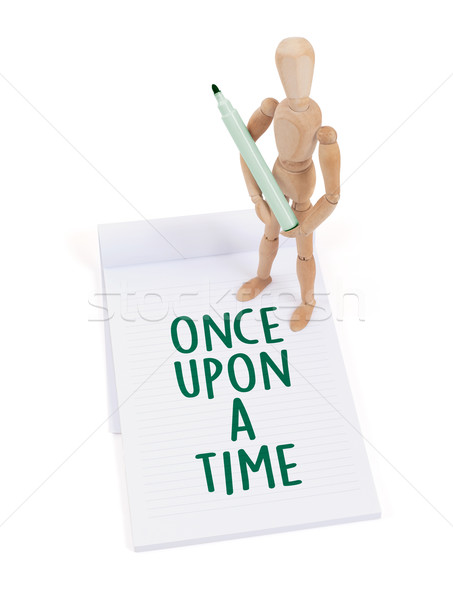 Wooden mannequin writing - Once upon a time Stock photo © michaklootwijk
