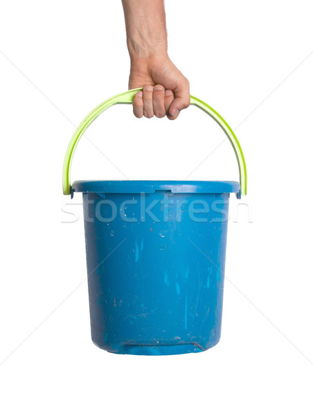 Human hand holding empty plastic pail Stock photo © michaklootwijk