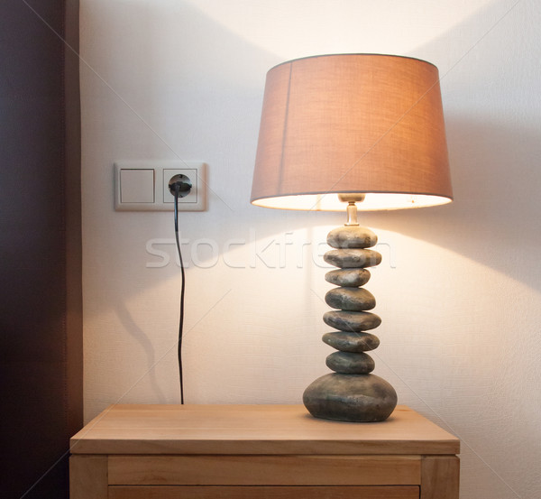 Modern table lamp on a bedside table Stock photo © michaklootwijk