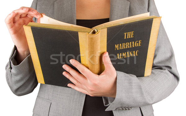 Nő olvas házasság évkönyv takarékosság kéz Stock fotó © michaklootwijk