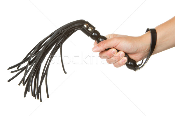 Strict Black Leather Flogging Whip in woman's hand Stock photo © michaklootwijk