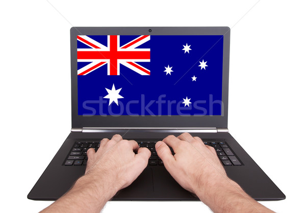 Mãos trabalhando laptop Austrália tela Foto stock © michaklootwijk