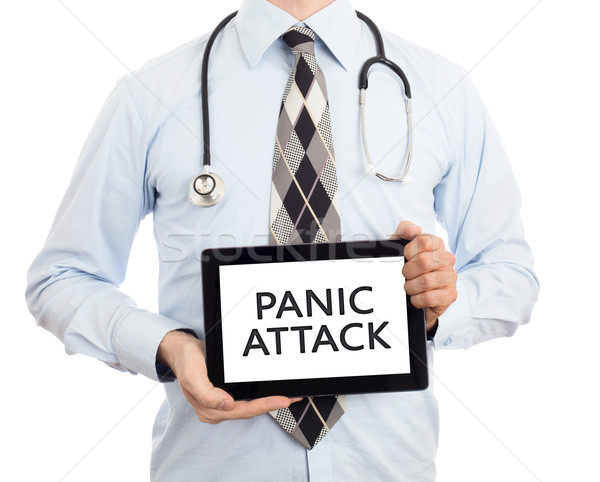 Arzt halten Tablet Panik angreifen isoliert Stock foto © michaklootwijk