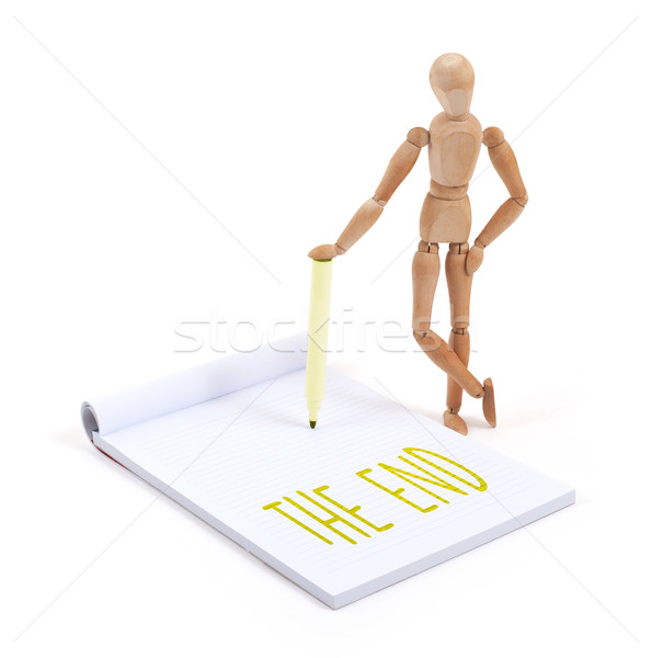 Wooden mannequin writing - The end Stock photo © michaklootwijk