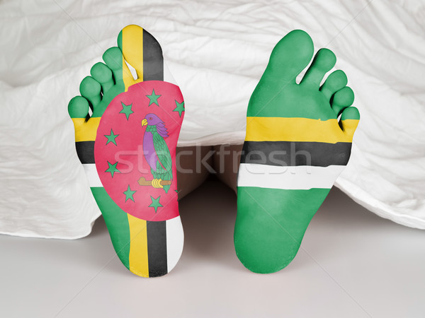 Pies bandera dormir muerte Dominica mujer Foto stock © michaklootwijk