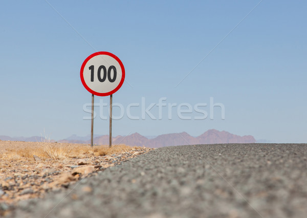 Hız limiti imzalamak çöl yol Namibya 100 Stok fotoğraf © michaklootwijk