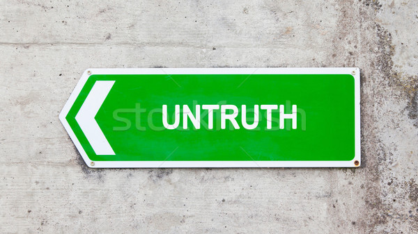 Green sign - Untruth Stock photo © michaklootwijk