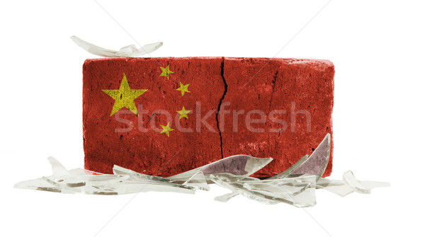 Ladrillo vidrios rotos violencia bandera China pared Foto stock © michaklootwijk