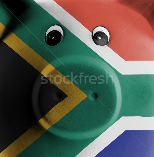 Ceramic piggy bank with painting of national flag  Stock photo © michaklootwijk