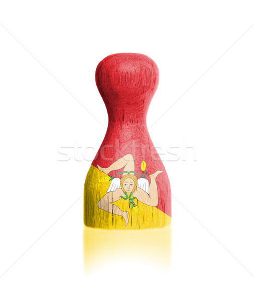 Stock photo: Wooden pawn with a painting of a flag