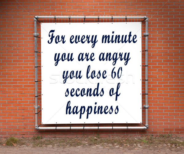 Large banner with inspirational quote on a brick wall Stock photo © michaklootwijk