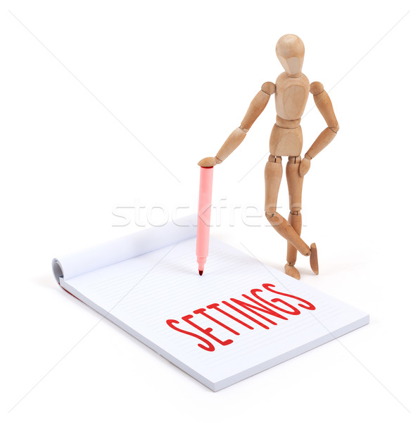 Wooden mannequin writing - Settings Stock photo © michaklootwijk
