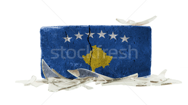 Ziegel Glasscherben Gewalt Flagge Kosovo Wand Stock foto © michaklootwijk
