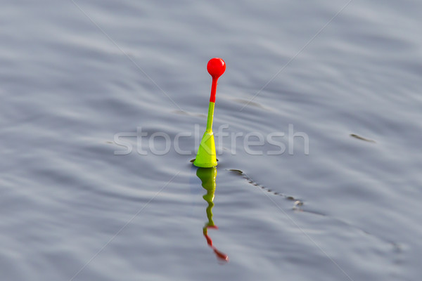 Fishing float floating Stock photo © michaklootwijk