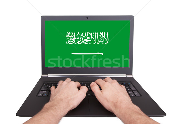 Kezek dolgozik laptop Szaúd-Arábia mutat képernyő Stock fotó © michaklootwijk