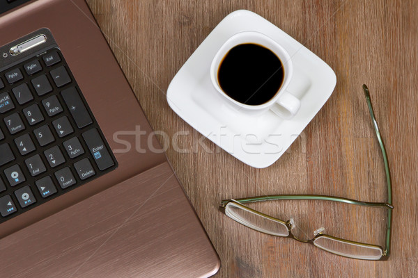Espresso kawy laptop okulary podłóg drewnianych papieru Zdjęcia stock © michaklootwijk