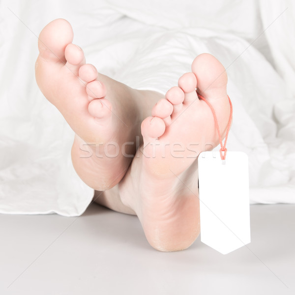 Cadáver dedo del pie etiqueta blanco hoja Foto stock © michaklootwijk