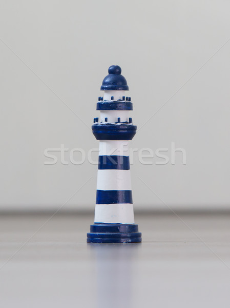 Blau weiß gestreift Leuchtturm isoliert Stock foto © michaklootwijk
