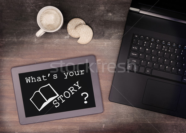 Tablet touch computer gadget on wooden table, what's your story Stock photo © michaklootwijk