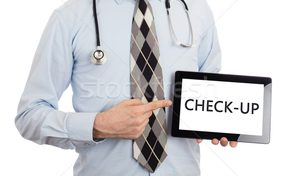 Stock photo: Doctor holding tablet - Check-up