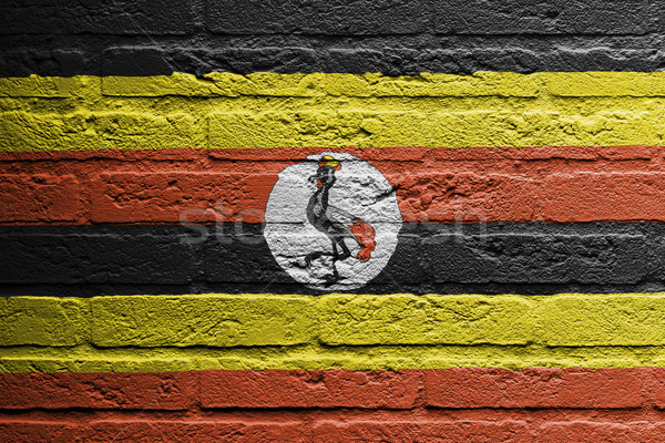 Brick wall with a painting of a flag, Uganda Stock photo © michaklootwijk