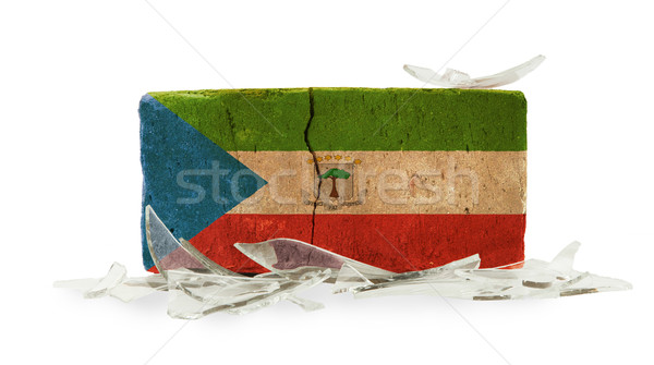 Tijolo cacos de vidro violência bandeira Guiné Equatorial parede Foto stock © michaklootwijk