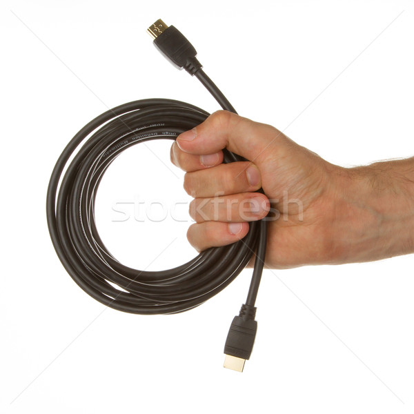 Stock photo: Close-up of hdmi cable in a hand