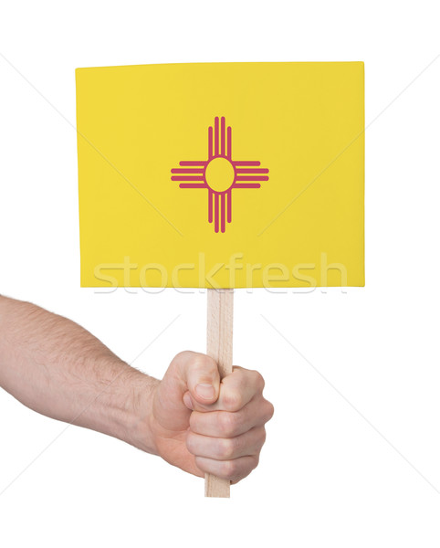 Kéz tart kicsi kártya zászló Új-Mexikó Stock fotó © michaklootwijk