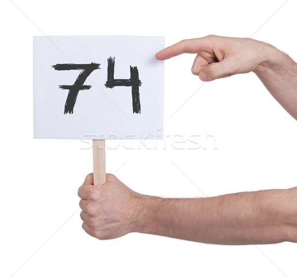 Sign with a number, 74 Stock photo © michaklootwijk
