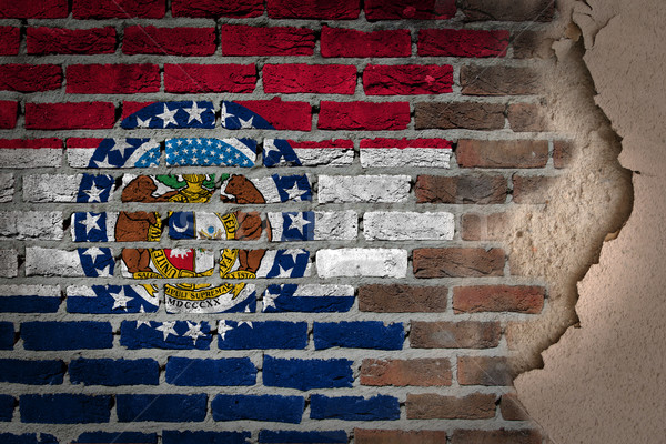 Stock photo: Dark brick wall with plaster - Missouri