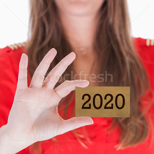 Woman showing a business card - 2020 Stock photo © michaklootwijk