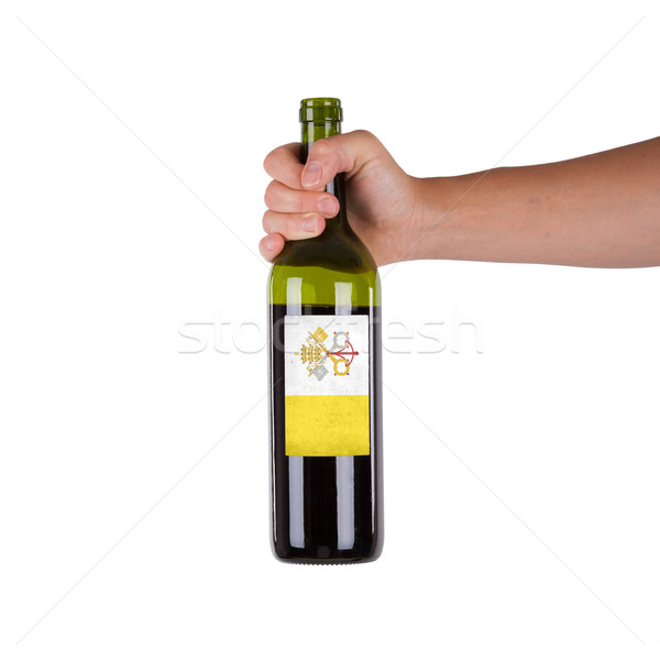 Kéz tart üveg vörösbor címke Vatikán Stock fotó © michaklootwijk