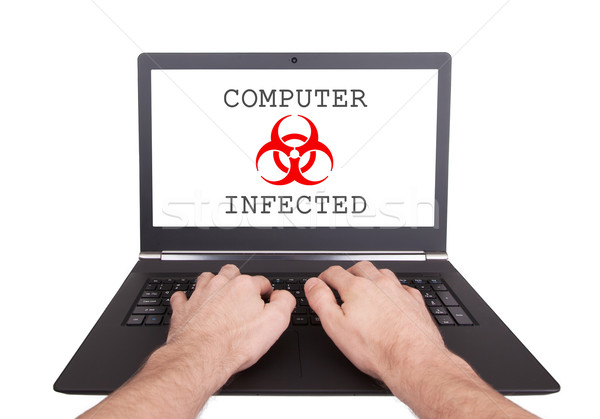 Mann arbeiten Laptop-Computer infiziert isoliert Laptop Stock foto © michaklootwijk