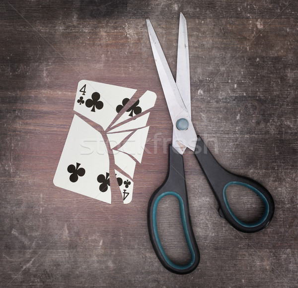 Concept of addiction, card with scissors Stock photo © michaklootwijk
