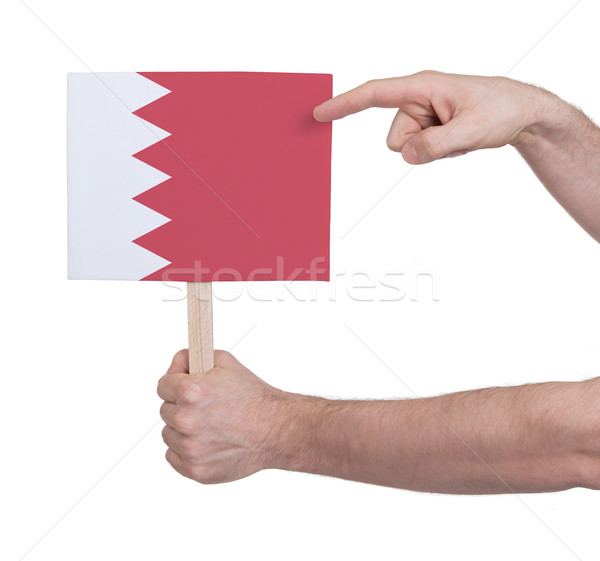 Hand holding small card - Flag of Bahrain Stock photo © michaklootwijk