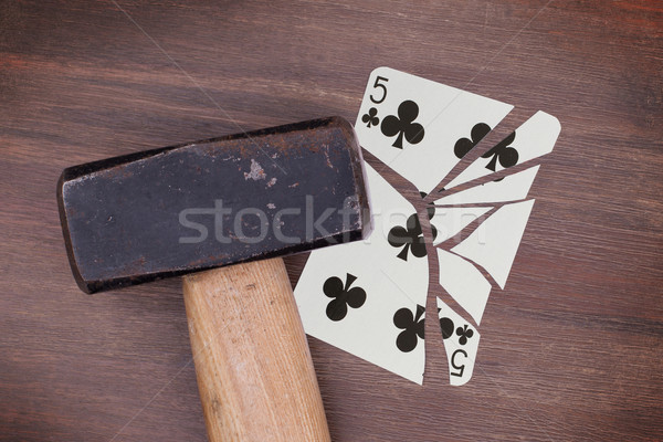 Hammer with a broken card, five of clubs Stock photo © michaklootwijk