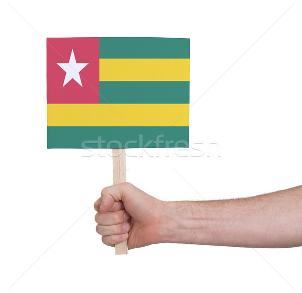 Hand holding small card - Flag of Togo Stock photo © michaklootwijk
