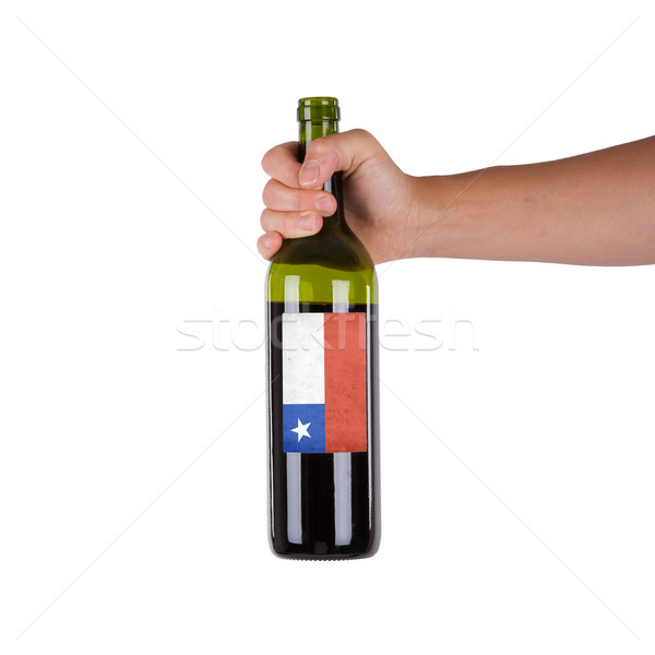 Mão garrafa vinho tinto etiqueta Chile Foto stock © michaklootwijk