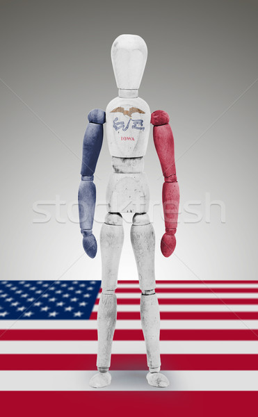 Stock photo: Wood figure mannequin with US state flag bodypaint - Iowa