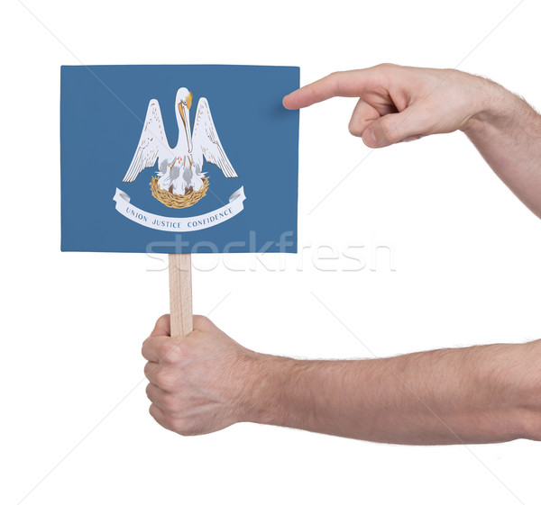 Hand holding small card - Flag of Louisiana Stock photo © michaklootwijk