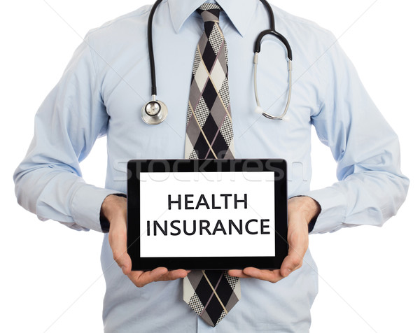 Doctor holding tablet - Health insurance Stock photo © michaklootwijk