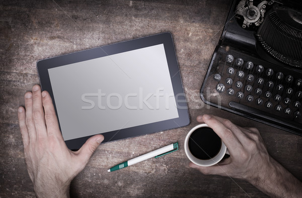 Tablet touch computer gadget on wooden table Stock photo © michaklootwijk