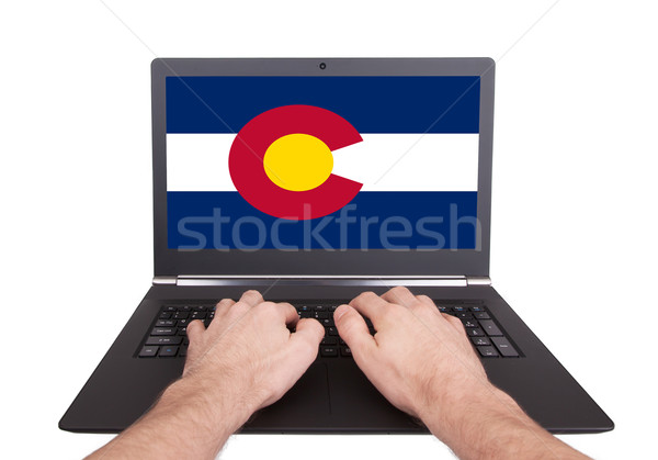 Hands working on laptop, Colorado Stock photo © michaklootwijk