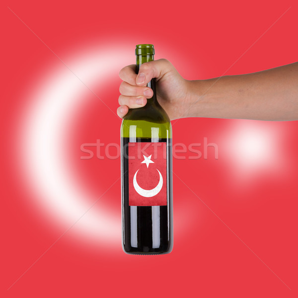 Mano bottiglia vino rosso etichetta Turchia Foto d'archivio © michaklootwijk